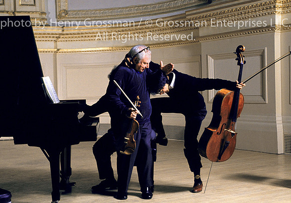 Isaac Stern, Yo yo Ma and Emmanuel Ax joking around on stage Carnegie Hall